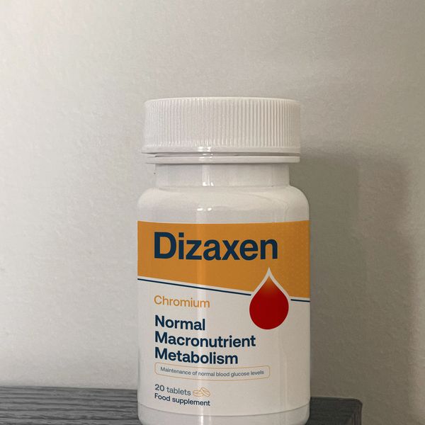 Fehér Dizaxen flakon narancssárga címkével, 20 tabletta